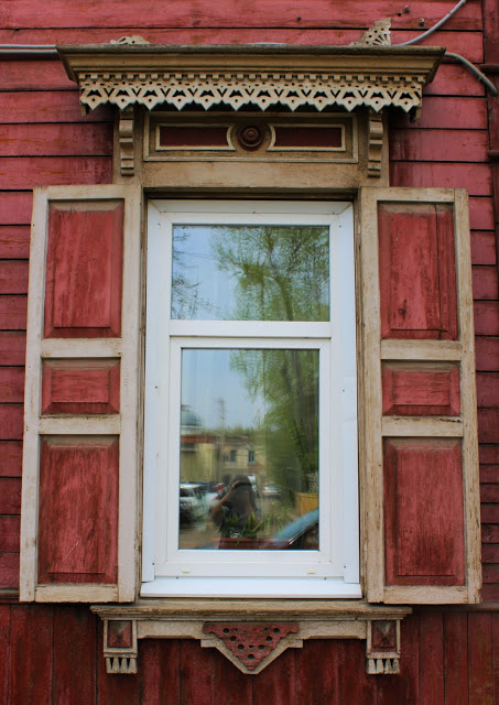 Architecture - red Russian shutters.