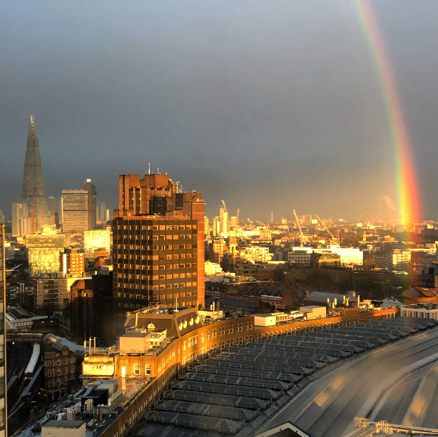 Q1 2020 - a rainbow over London, with a view of the Shard and Waterloo train station included. The buildings are shining golden in the sunset light.
