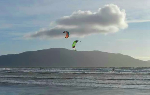 Kite surfers on the beach